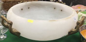 A large alabaster ceiling light shade with four brass handle decoration