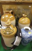 Three stoneware flagons inscribed "Zachary and Butler Cirencester",