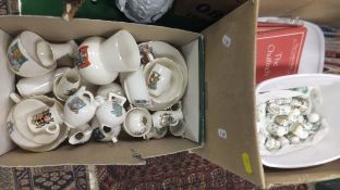 A box containing a collection of W H Goss and other crested china wares to include Dorset vase,