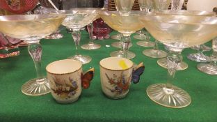 A set of six Babycham glasses, a suite of other glasses to include eight wine glasses, a decanter,