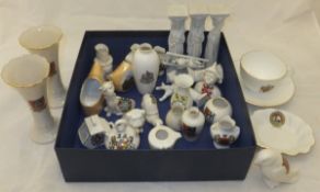 A box containing a collection of W H Goss and other crested wares to include Norwich vases,