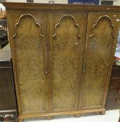 An early 20th Century burr walnut wardrobe in the manner of Maple & Co CONDITION REPORTS Overall