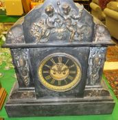 A Victorian black slate cased and brass embellished mantel clock of large proportions,