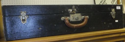 A Louis Vuitton gentleman's black leather covered travel case,