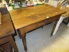 An elm topped table with single frieze drawer,