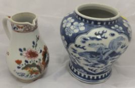 A large 20th Century blue ground twin-handled Japanese vase,