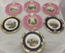 A set of four porcelain hand-painted cabinet plates, each bearing monogram "SR",