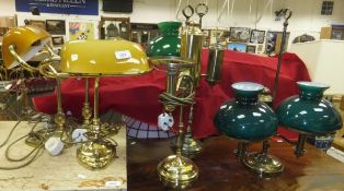 Three brassed desk lamps with glass shades,