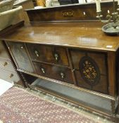 An Edwardian mahogany sideboard in the Dutch taste,