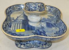 An early 19th Century blue transfer decorated egg cruet stand,