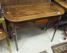 A 19th Century mahogany fold-over card table on square tapered legs to spade feet