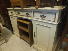 A 19th Century pine corner cupboard with single glazed door opening to reveal various shelving,
