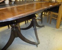 A reproduction mahogany pedestal dining table, with two extra leaves plus a large picture frame,