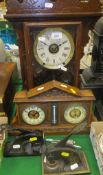 A late 19th Century French oak cased mantel clock with barometer and thermometer,