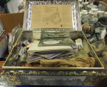 A German biscuit tin containing various cigarette albums, cards and silks, together with a box