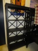 A pair of black painted OKA style open book cases of four tiers (2)