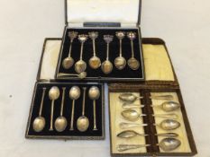 A cased set of six silver souvenir spoons bearing emblems for Carnarvon, Canterbury, Dover,