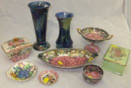 A collection of Maling ware to include two 1931 "Storm" pattern vases, a "Peony rose,