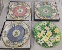 A Maling plate in "Daffodil grey" pattern, together with a set of three Maling souvenir plates,