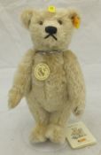 A Steiff 1920 Classic reproduction gold plush teddy bear, a Steiff Teddybear 24 circa 2001,