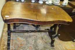 A Victorian shaped top rosewood veneered centre table