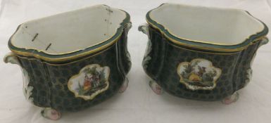 A pair of early 20th Century Meissen cachepots of shaped D form and with scrolling acanthus