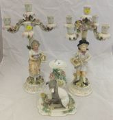 A pair of Dresden porcelain figural candelabra, together with a Dresden porcelain vase decorated