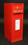 A reproduction Victorian style GPO post box in red paintwork *