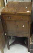 A late 19th Century mahogany and rosewood cross banded wash stand with rising top over two cupboard