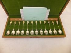 A cased set of twelve John Pinches silver Royal Horticultural Society flower spoons