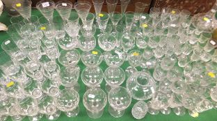 A large quantity of various glassware to include ale, flutes, wines, champagne glasses, tumblers,