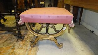 A 19th Century giltwood X-framed stool,