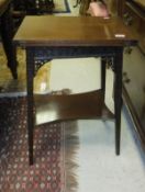 A Victorian cast iron framed reading table with acanthus decoration to ball and claw feet,