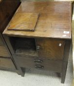 A 19th Century mahogany night table with two cupboard doors above a pot drawer