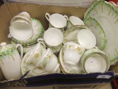 A box containing a Royal Albert "April Showers" part tea service,