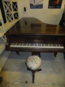 A late 19th Century rosewood cased boudoir grand piano the iron framed straight strung movement by