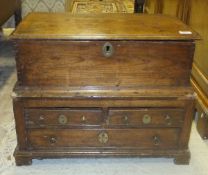 A 19th Century Welsh oak and pine coffer bach with rising lid over two short and one long drawer