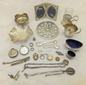 A box containing assorted silver and plated wares to include two open salts, two medallions,