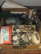 A box containing a Huntley & Palmer's Christmas biscuit tin, various vases, a candelabra,