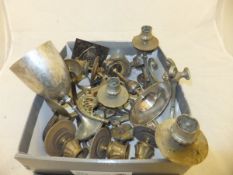 A box containing assorted metal wares to include candle sconces, a circa 1930's travel clock, etc,