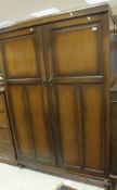 A 20th Century oak two door wardrobe