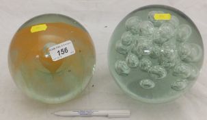 A large paperweight with large bubble decoration to interior,