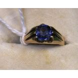 A gold and Sri Lankan sapphire set ring, the sapphire approx 0.