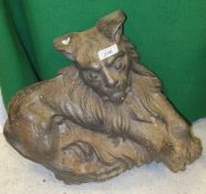 A cast iron figure of a lion (possibly taken from part of a fireplace)
