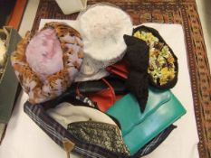 A box containing assorted collars, hats, fur stoles, spats, undergarments, etc,