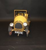 A painted tin "Brum" pedal car