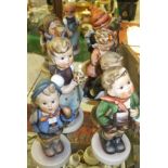 A collection of ten Goebel Hummel figures to include "Boy with basket",