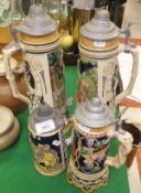 Four assorted steins including musical stein with mark to base "Trink Bruderlein Trink"