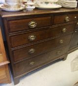 A 19th Century oak and crossbanded chest of two short over three long drawers,