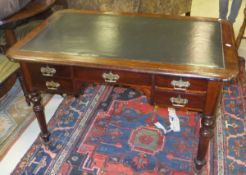 A late Victorian mahogany desk with green leather inset top and five assorted drawers on turned